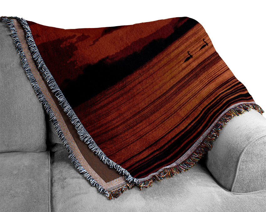 Swans On The Orange Ocean Reflection Woven Blanket