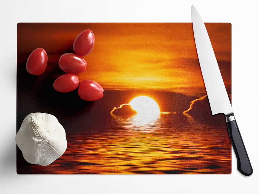 The Sun Falls In The Ocean Glass Chopping Board