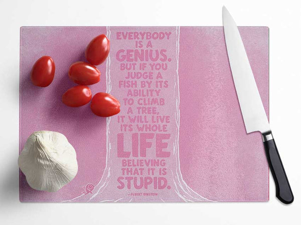 Motivational Quote Albert Einstein Everybody Is A Genius Pink Glass Chopping Board