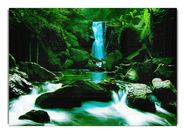 The Waterfall Flows Over The Rocks