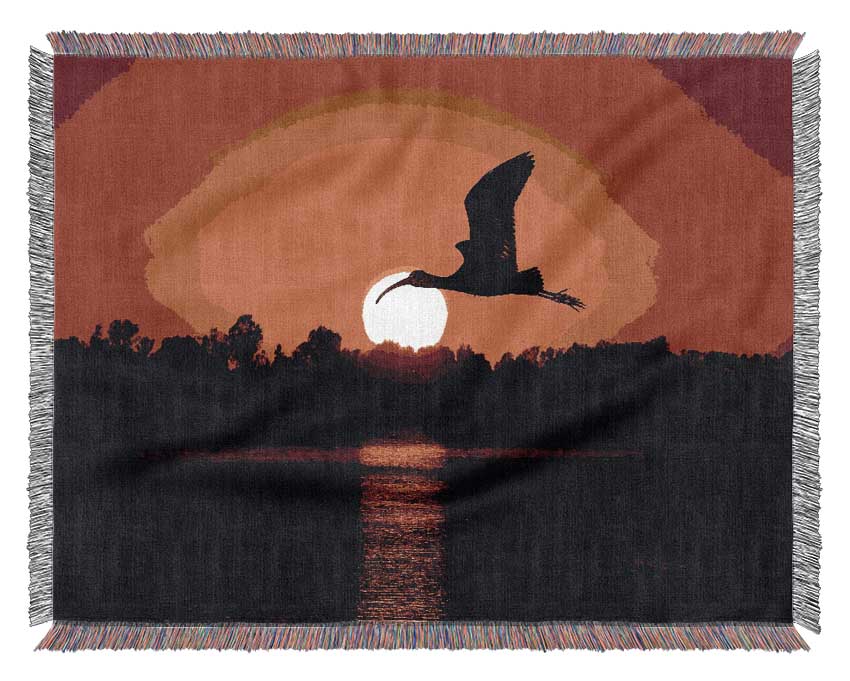 Bird Flying At Sunset Woven Blanket