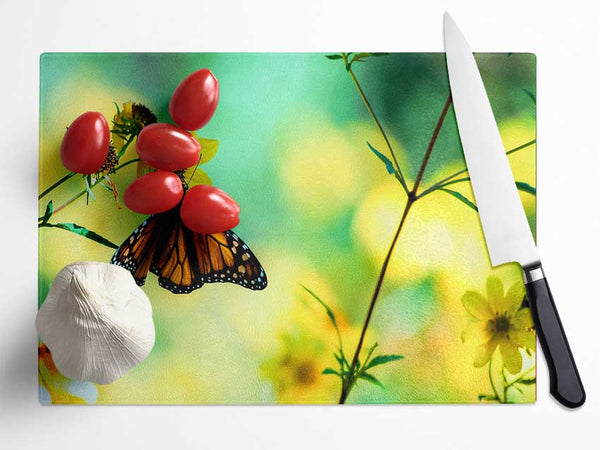 Monarch Butterfly On A Yellow Flower Glass Chopping Board