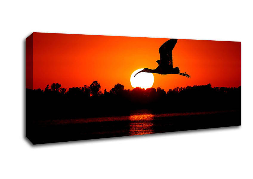 Picture of Bird Flying At Sunset Panoramic Canvas Wall Art