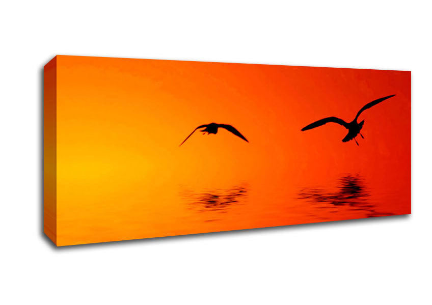 Picture of Orange Ocean Flight Panoramic Canvas Wall Art