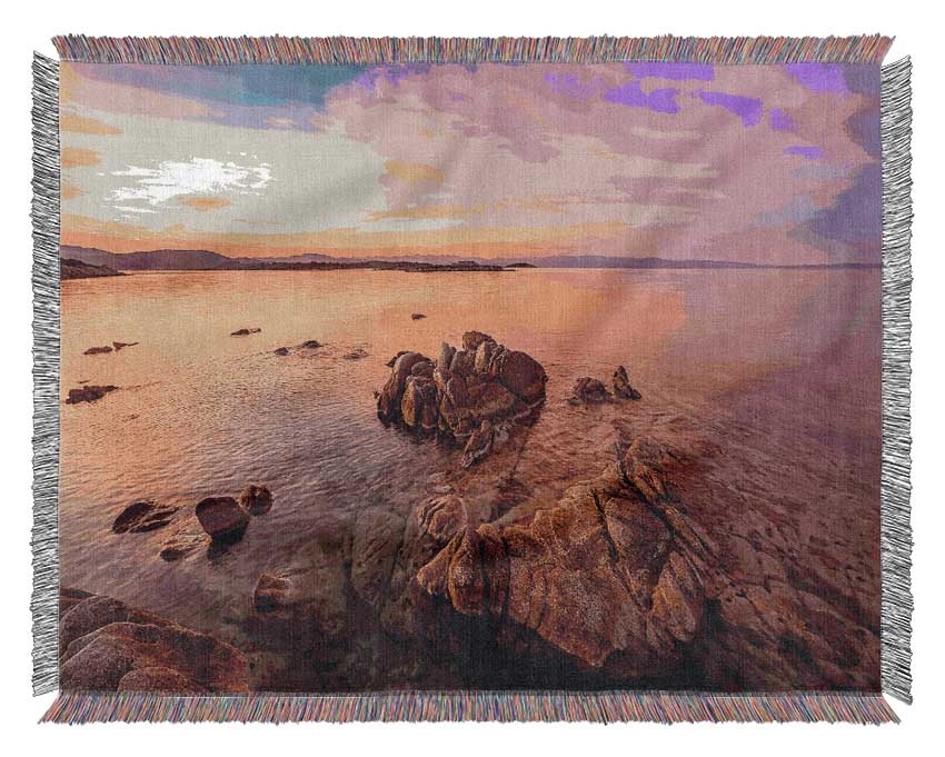 Pink Skies Over The Ocean Rocks Woven Blanket