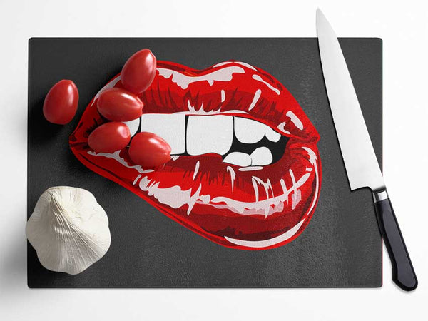 Red Lip Bite On Grey Glass Chopping Board