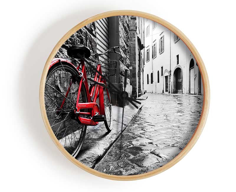 Red Bicycle In The Cobbled Streets Clock - Wallart-Direct UK