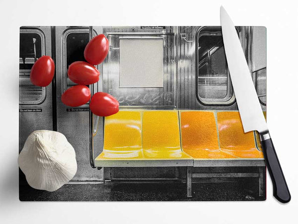 Yellow Seats In The Subway Glass Chopping Board