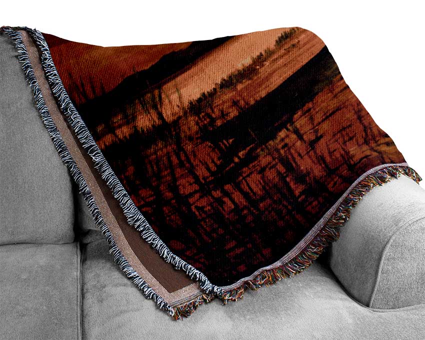 Row Boat On The Sunset Waters Woven Blanket