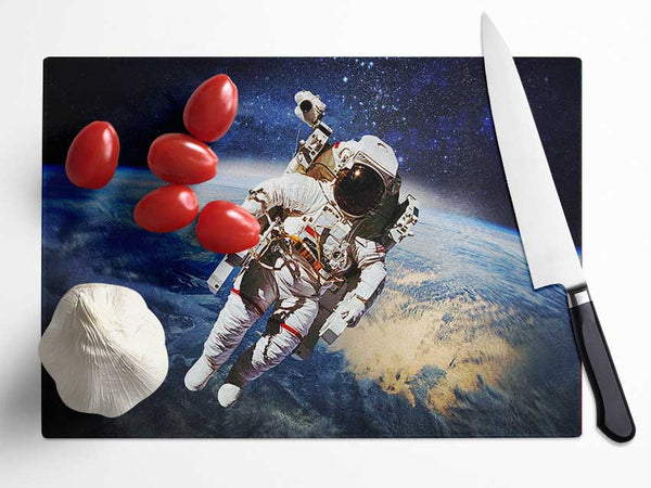 Astronaut Above The Earth Glass Chopping Board