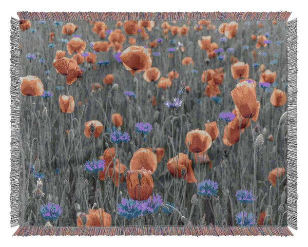 Red poppies blue field Woven Blanket