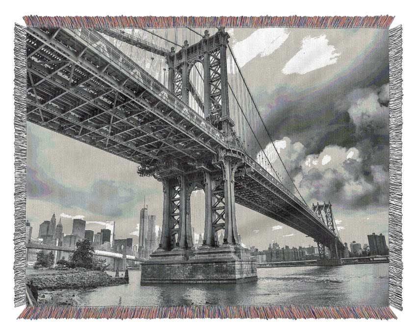 NYC black and white bridge under clouds Woven Blanket