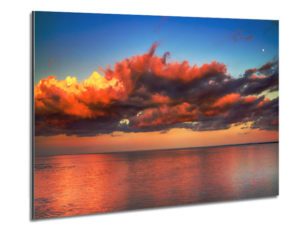 Red glowing clouds above the sea