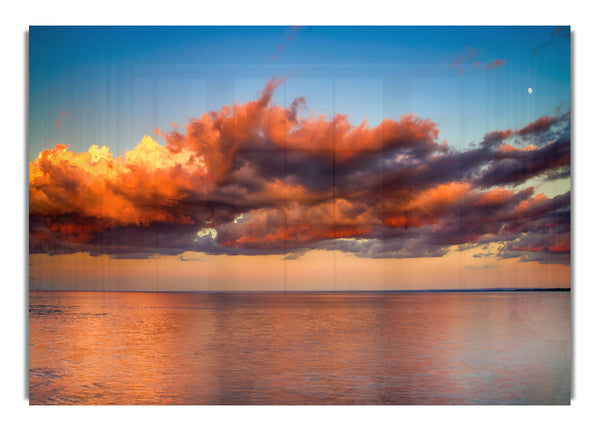 Red glowing clouds above the sea