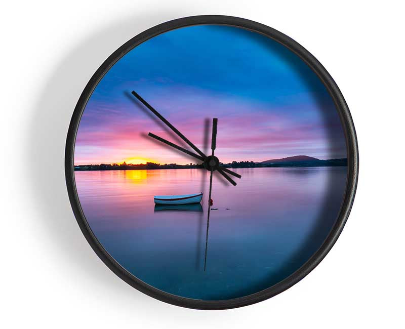 Small row boat on calm lake Clock - Wallart-Direct UK