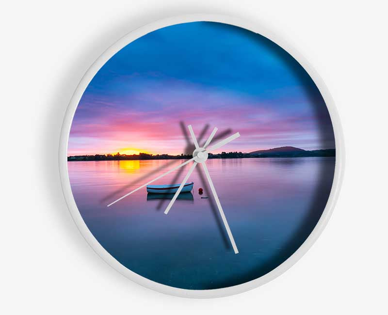 Small row boat on calm lake Clock - Wallart-Direct UK