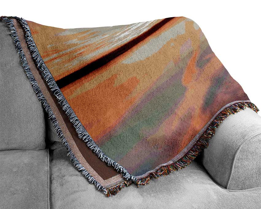 Sunset off the jeti Woven Blanket