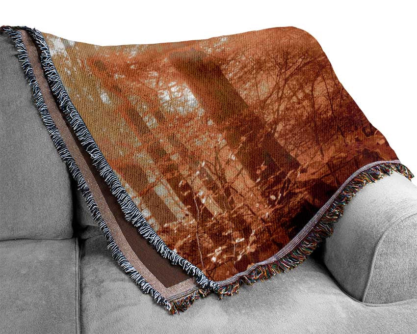 Autumn forest sunrays Woven Blanket