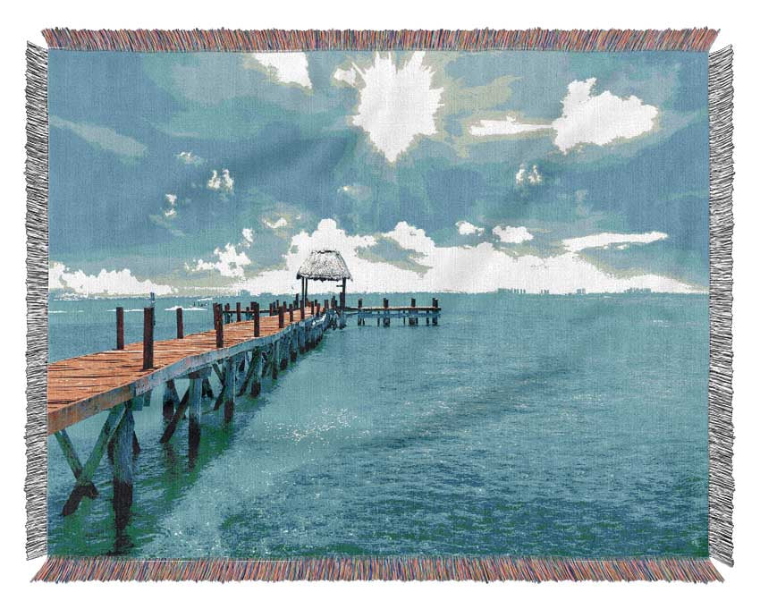 Blue rays on the pier Woven Blanket