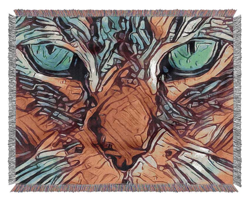 Cat eyes close in view Woven Blanket