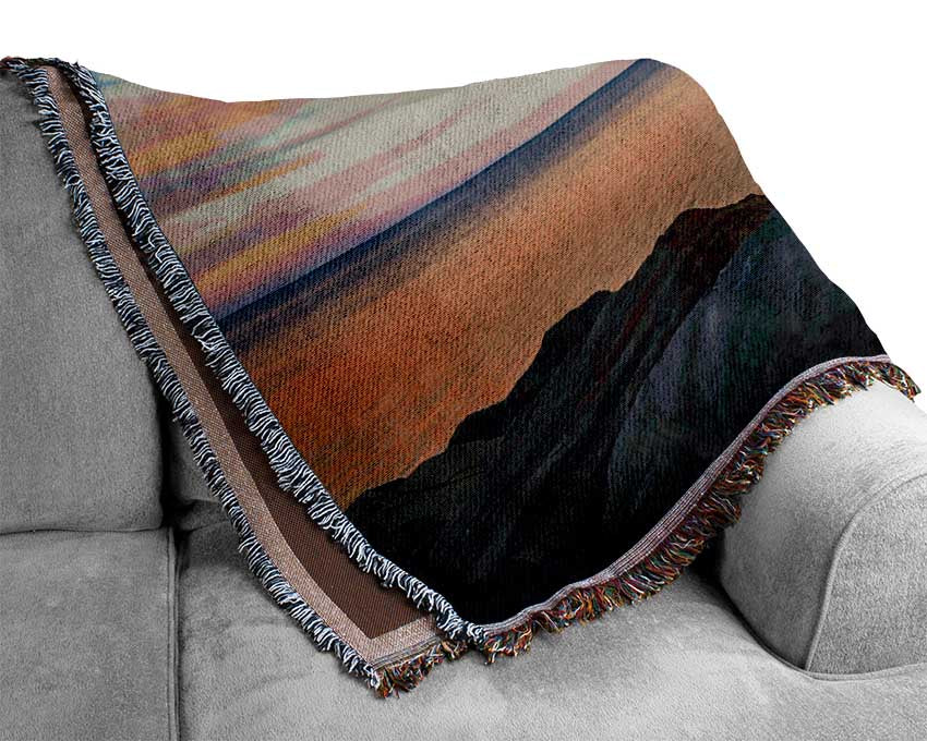 Scenic view out to sea Woven Blanket