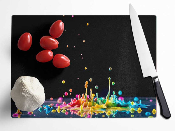 Colour splashes on a surface Glass Chopping Board