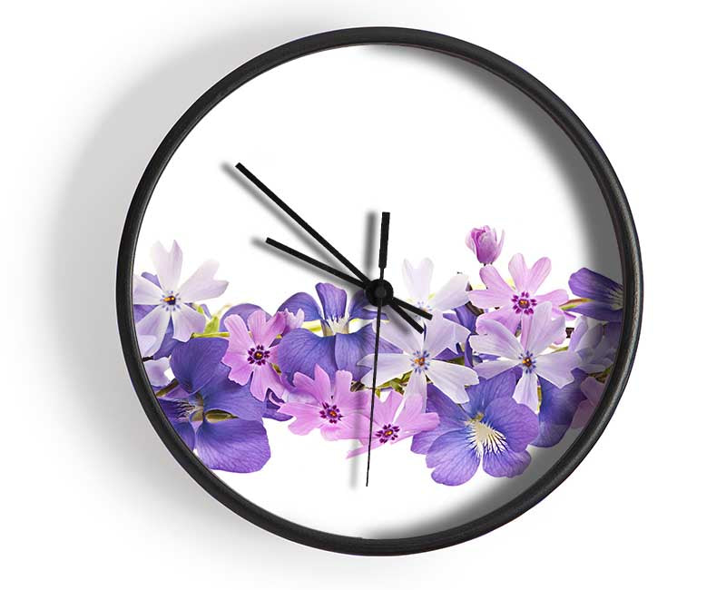 Pink and violet flowers laid out Clock - Wallart-Direct UK