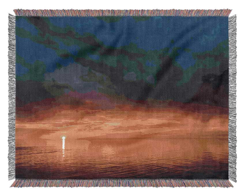 Storms arriving over the sunset Woven Blanket