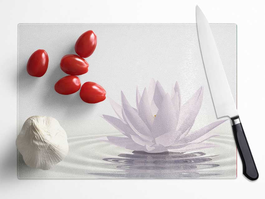 White lotus on rippled water Glass Chopping Board