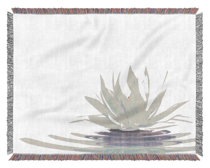 White lotus on rippled water Woven Blanket