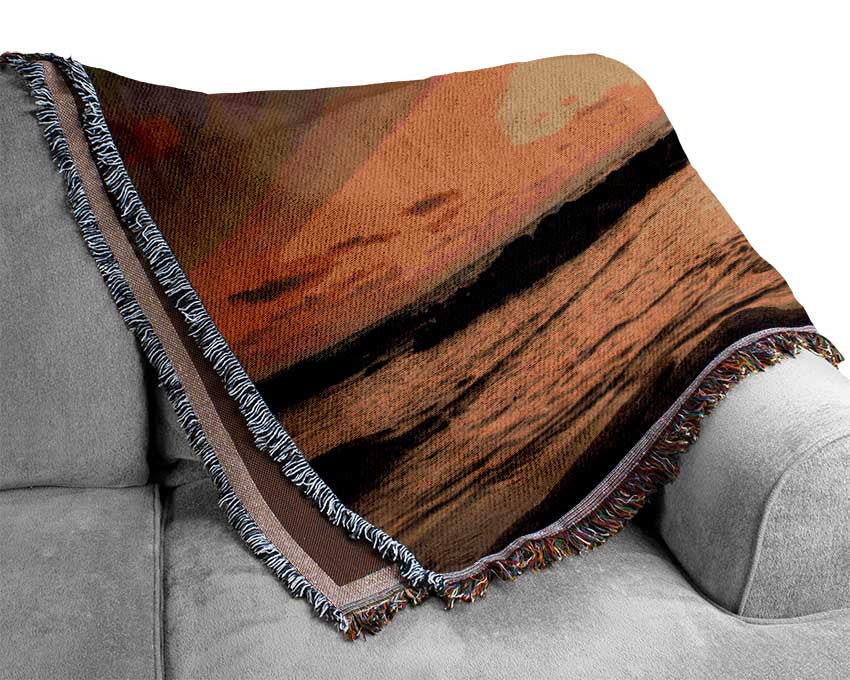 Sunset finishing boat on the beach Woven Blanket