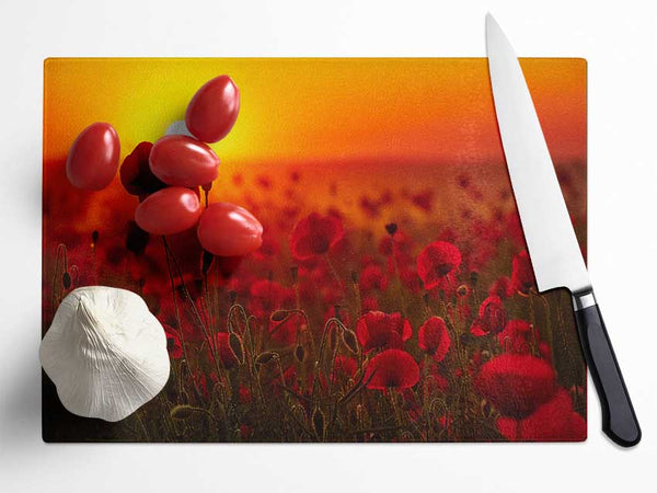 Poppies in the sunset reds Glass Chopping Board