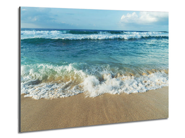 Crashing waves on the sandy beach