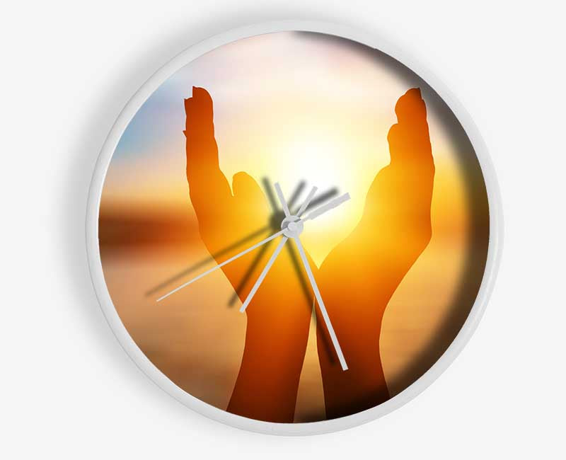 Sunset between hands Clock - Wallart-Direct UK