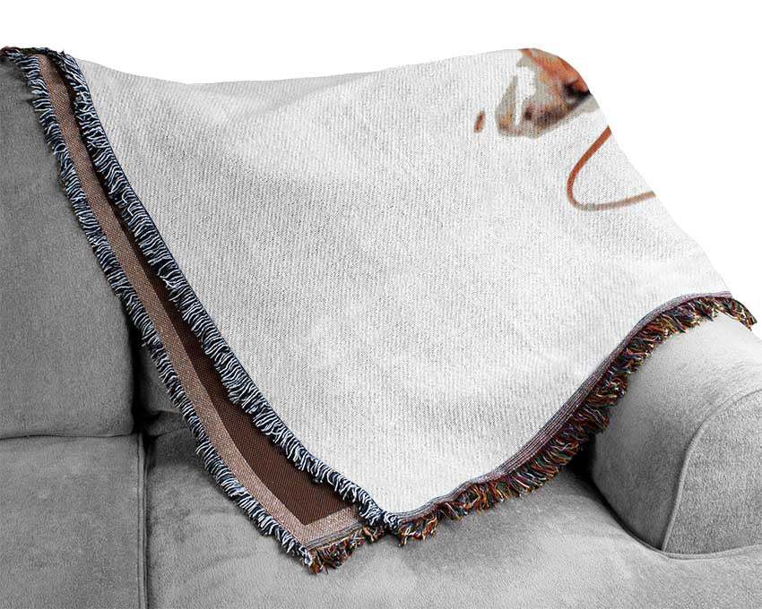 Dog listening to music relaxing Woven Blanket