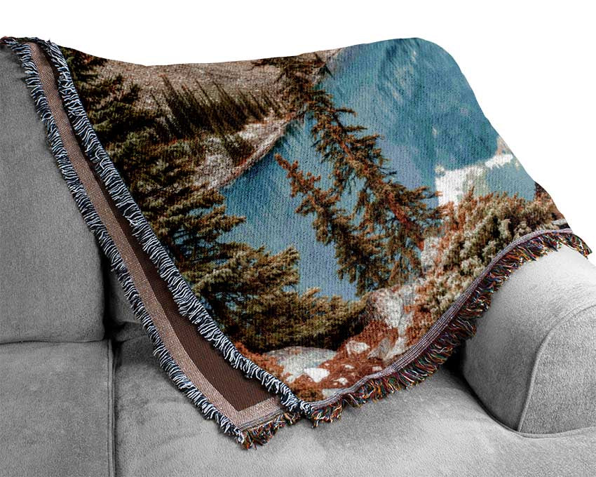 Canadian mountains with clear blue waters Woven Blanket