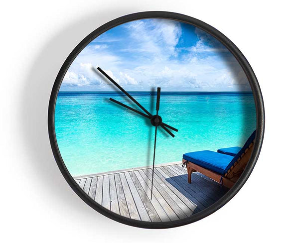 sunchairs on decking on the beach Clock - Wallart-Direct UK