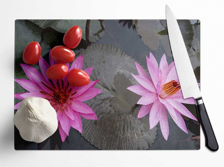 Pink flowers in the lake Glass Chopping Board