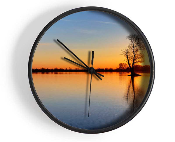 Sunset above the trees river Clock - Wallart-Direct UK