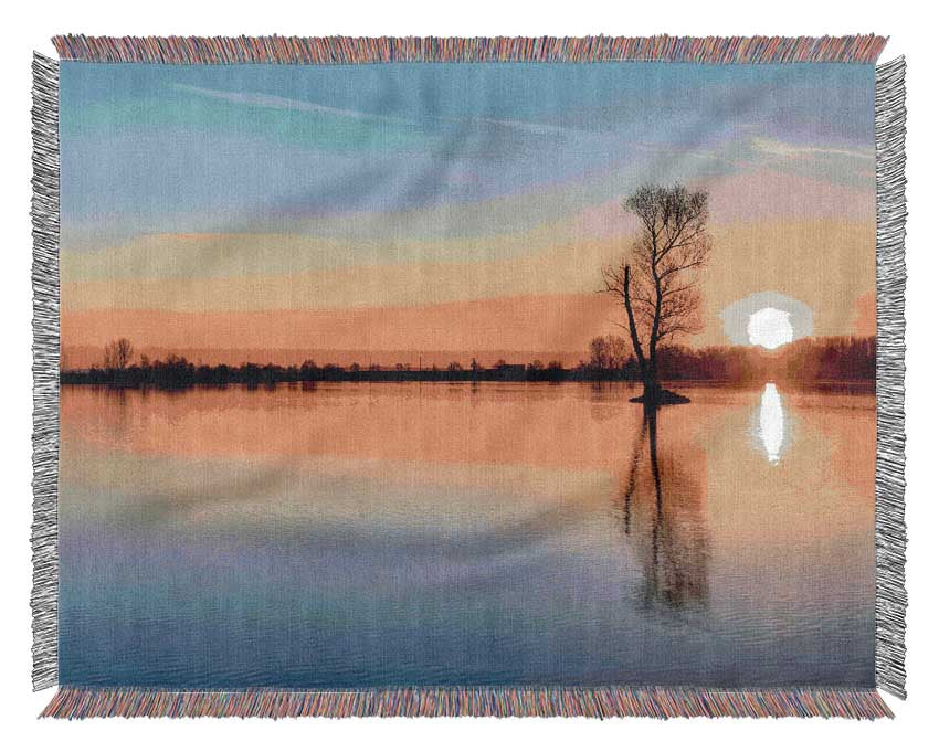 Sunset above the trees river Woven Blanket