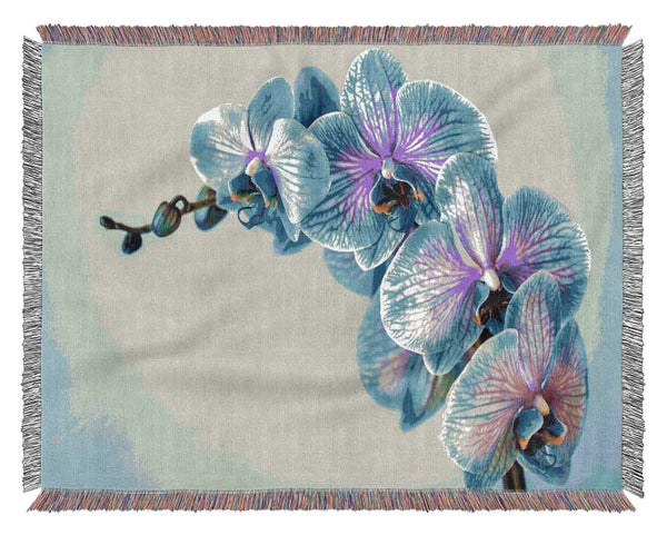 Blue orchids close up Woven Blanket