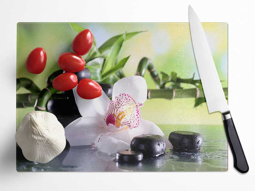 Orchids on the stones bamboo Glass Chopping Board