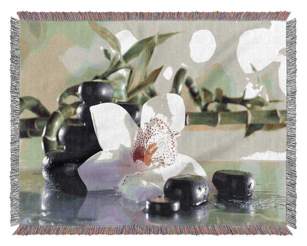 Orchids on the stones bamboo Woven Blanket