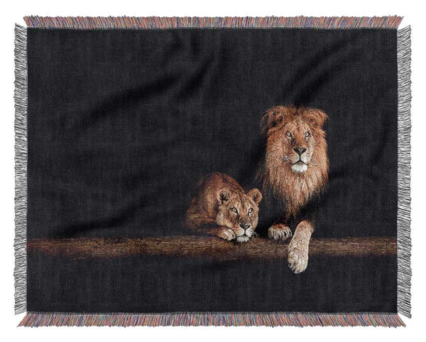 Lions resting in the dark Woven Blanket