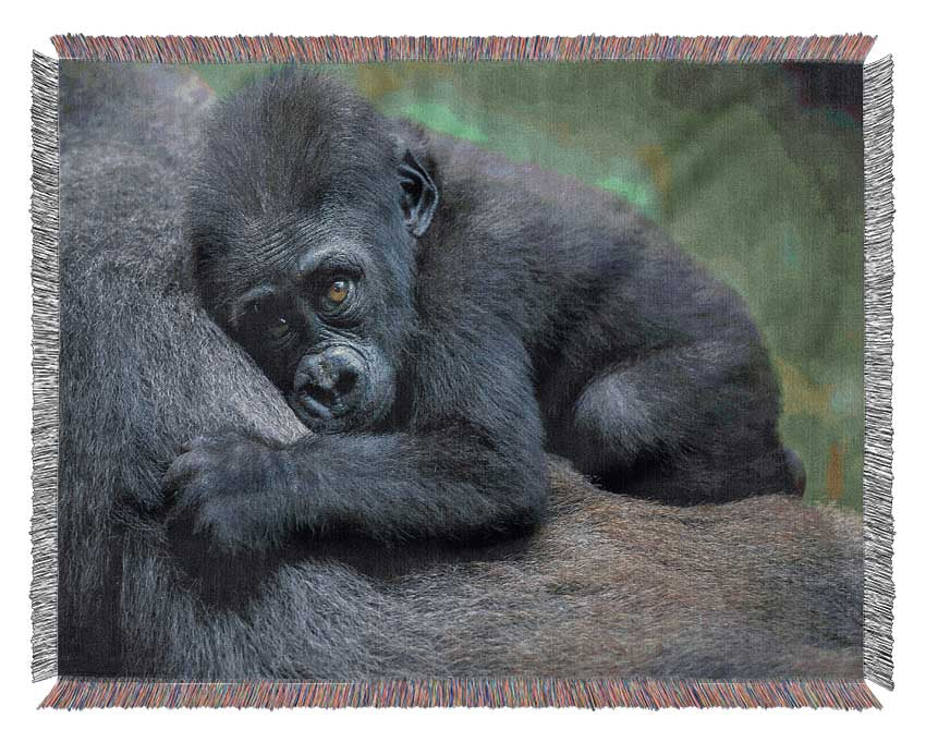 Baby gorilla Holding on Woven Blanket