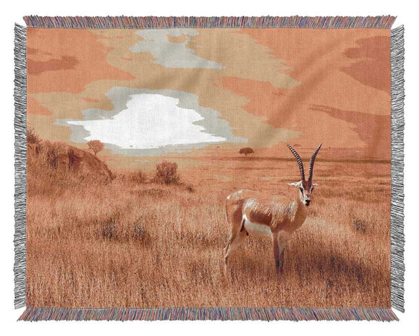 Gazelle in the grasslands Woven Blanket