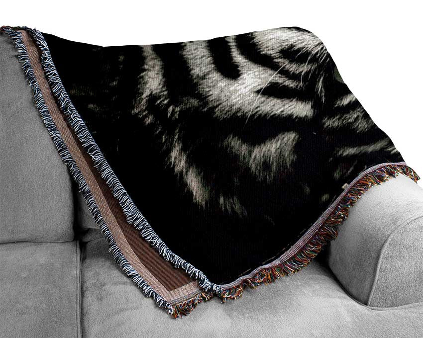 Up close tiger lying down Woven Blanket