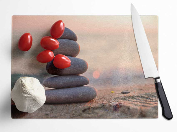 Zen stones stacked up on beach Glass Chopping Board