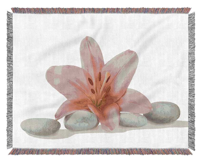 Pink Lilly on grey pebbles Woven Blanket