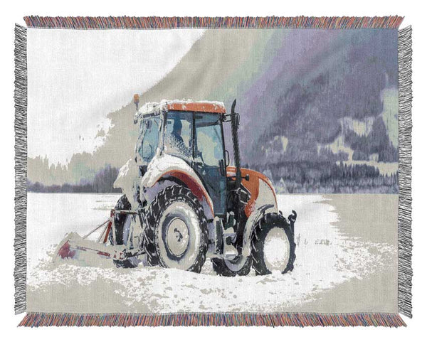 Tractor in the snow Woven Blanket